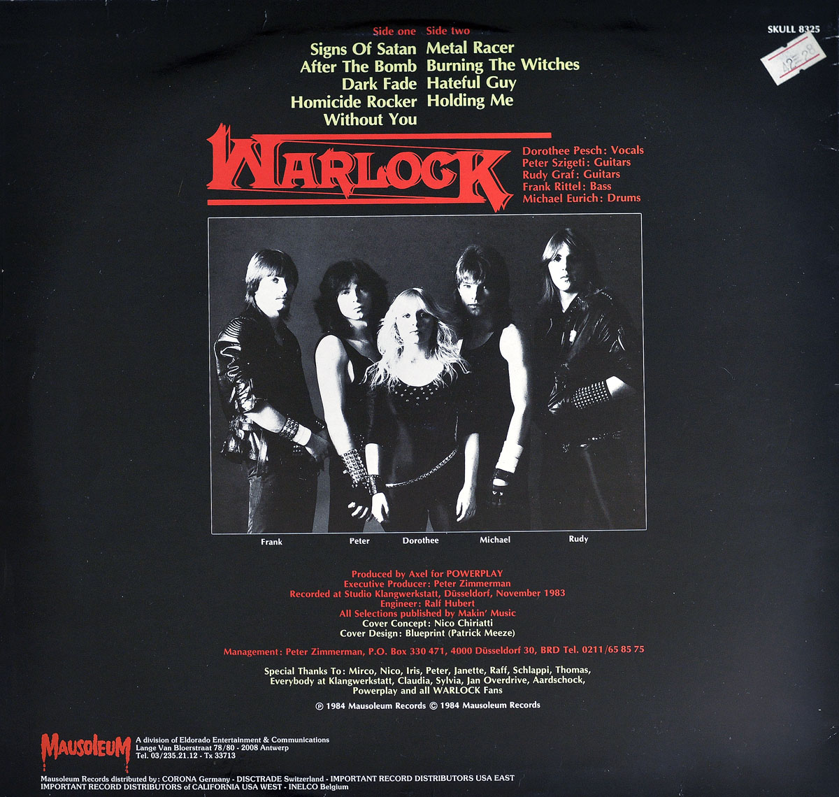 Back cover of Warlock Burning the Witches with black and white band photo and track listing